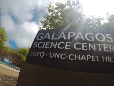 A sign outside the Galapagos Science Center with the center's name, 